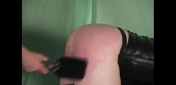  Mistress Kelly spanks and paddles her slave on the spanking horse